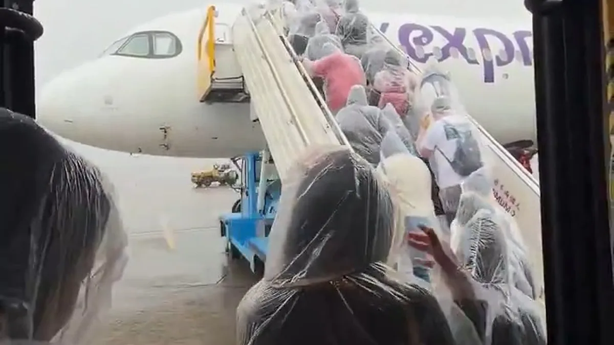 HK Express'ten Tayfun Noul Etkisindeki Yolculara Yağmurluk Desteği